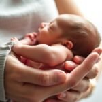newborn carrying techniques overview