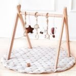 engaging wooden baby gym